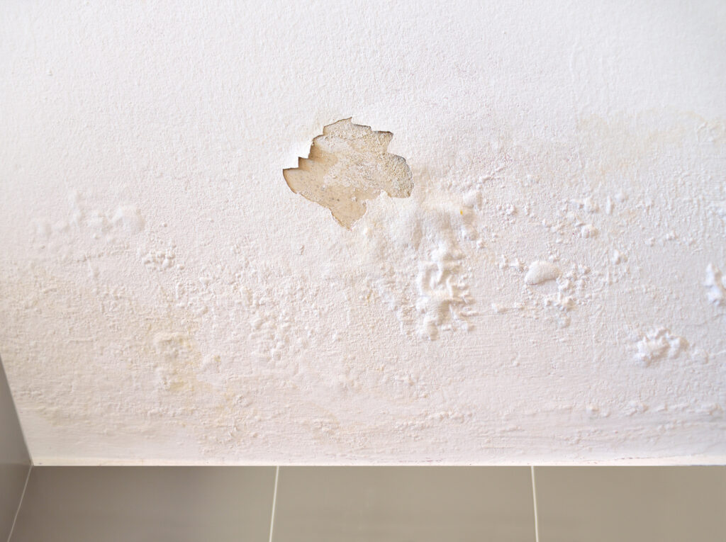 wall leak leading to peeling paint and leak spots
