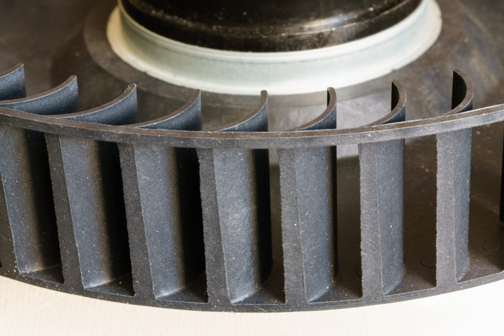 Close-up of dirty AC blower wheel